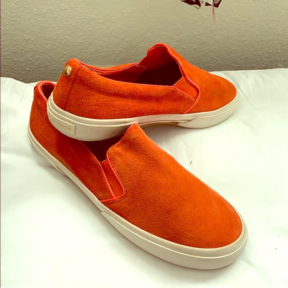 Michael Kors orange suede slip on shoes